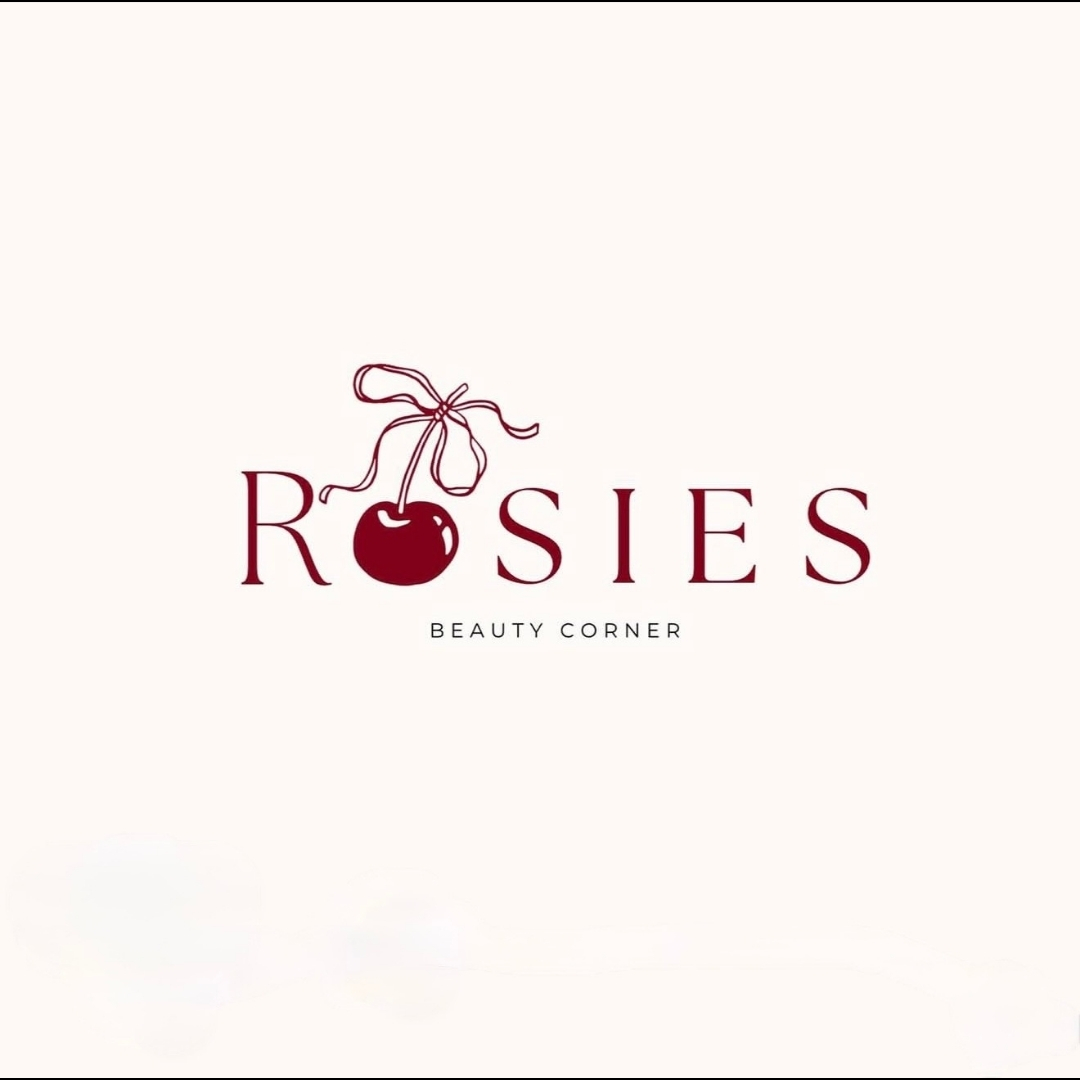 Rosie's Beauty Corner brand mark — cherry and bow logo with Beauty Corner lettering